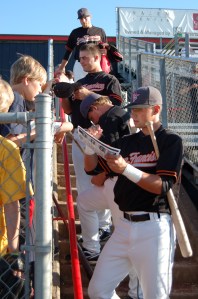 Volcanoes players sign a few autographs