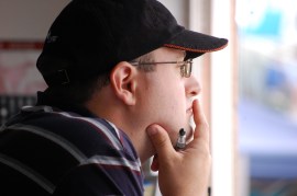 The Official Scorekeeper is often deep in thought as they concentrate on the game.